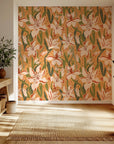 Substantial, impressionistic flowers showing tones of deep gold and burnt orange, forming a cozy floral motif wallpaper