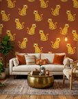Amber Glimmer Terracotta Leopard Print Wallpaper in a warm and inviting living room