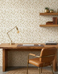 Amber Leaf gold botanical wallpaper adding character to a cozy bedroom