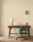 Amber Mosaic golden geometric peel and stick wallpaper as a feature wall in a bright home office