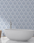 Blue and white Amber Blossom Ballet damask wallpaper in modern bathroom with freestanding tub