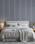 Anchor Chain navy geometric peel and stick wallpaper adding character to a cozy bedroom