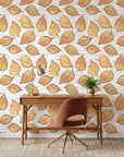 Ancient Ground beige botanical leaf wallpaper as a feature wall in a bright home office