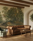 Vintage forest landscape Ancient Woodland wallpaper mural in earthy greens and browns on rustic living room wall
