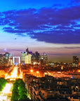 Dramatic Ancient & Modern wallpaper featuring Paris skyline at dusk with illuminated buildings and purple storm clouds
