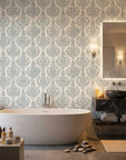 Antique Fern Mist sage green distressed damask wallpaper creating ambiance in a serene bathroom