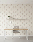 Antique Stripe Charm blush vintage floral wallpaper as a feature wall in a bright home office