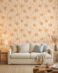 Apricot Tides warm coastal seashell wallpaper in a warm and inviting living room
