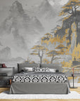 Asian Mountains wallpaper with gold and gray misty landscape on modern bedroom accent wall