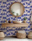 Palm tree wallpaper installed in a bathroom, adding a breezy island inspired atmosphere with detailed tropical foliage.