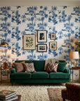 Azure Palms blue tropical jungle toile wallpaper in a warm and inviting living room