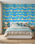 Azure Stacks blue and peach abstract brush stroke wallpaper adding character to a cozy bedroom