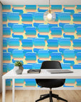 Azure Stacks blue and peach abstract brush stroke wallpaper as a feature wall in a bright home office