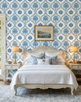 Azure Vista scenic toile wallpaper adding character to a cozy bedroom