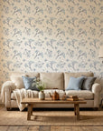 Azure Whisper blue sage wallpaper in a warm and inviting living room