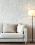 Hand-sketched, artisanal diamond patterns in cozy, light brown shades, suitable for a minimalist or grounded design
