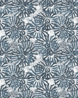 Batik Indigo textured blue floral wallpaper creating ambiance in a serene bathroom