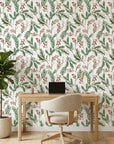 Berry & Pine green botanical wallpaper as a feature wall in a bright home office