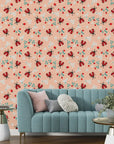 Pastel orange floral wallpaper with a smooth texture displaying a whimsical ladybug and strawberry motif. - Berry Wings