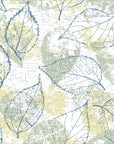 Blue Fossil distressed botanical peel and stick wallpaper creating ambiance in a serene bathroom