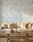 Blue Petal Cloud serene blue floral wallpaper adding character to a cozy bedroom