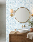 Blue Petal Cloud serene blue floral wallpaper as a feature wall in a bright home office
