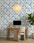 Blue Reverie serene floral peel and stick wallpaper as a feature wall in a bright home office