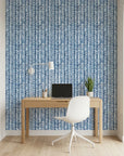 Blue Stitching navy and white chevron herringbone wallpaper as a feature wall in a bright home office