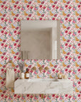Blush Bouquet vintage floral peel and stick wallpaper as a feature wall in a bright home office