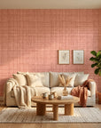 Blush Crossing textured rose peel and stick wallpaper in a warm and inviting living room