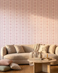 Blush Diamond pale pink geometric wallpaper in a warm and inviting living room