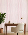 Blush Diamond pale pink geometric wallpaper as a feature wall in a bright home office