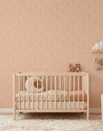 Blush Meander pink and cream retro stripe wallpaper adding character to a cozy bedroom