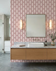 Blush Prism dusty rose art deco wallpaper creating ambiance in a serene bathroom