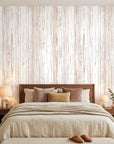 Blush Rainfall pale pink woodgrain wallpaper in a warm and inviting living room