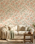 Blush Serenade vintage pink and sage floral damask wallpaper in a warm and inviting living room