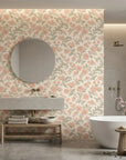 Blush Serenade vintage pink and sage floral damask wallpaper creating ambiance in a serene bathroom