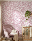 Blush Silhouette pink floral peel and stick wallpaper in a warm and inviting living room