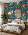 Bohemian Daisy retro floral wallpaper adding character to a cozy bedroom