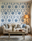 Botanica Grace classic blue rose toile wallpaper in a warm and inviting living room