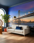 San Francisco Bay Bridge at twilight wallpaper mural in modern living room with blue and orange sunset tones
