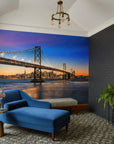 Blue and orange San Francisco Bay Bridge sunset mural wallpaper in modern living room