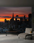 San Francisco skyline at sunset mural wallpaper featuring orange and purple sky with Transamerica Pyramid in modern living room