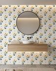 Buttercup Meadow yellow floral wallpaper creating ambiance in a serene bathroom