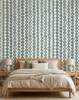 Cactus Lane serene green abstract wallpaper adding character to a cozy bedroom