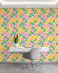 Candy Cobbles colorful retro geometric brick wallpaper as a feature wall in a bright home office