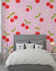 Red cherries and white daisies arranged in a geometric layout on self-adhesive wallpaper - Candy Bloom