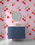 Peel and stick wall covering with a repeating pattern of bold red cherries and delicate white flowers - Candy Bloom