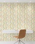 Canopy Fall earthy green leaf vine wallpaper as a feature wall in a bright home office