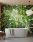 Looking up through tall forest canopy with green foliage texture peel and stick